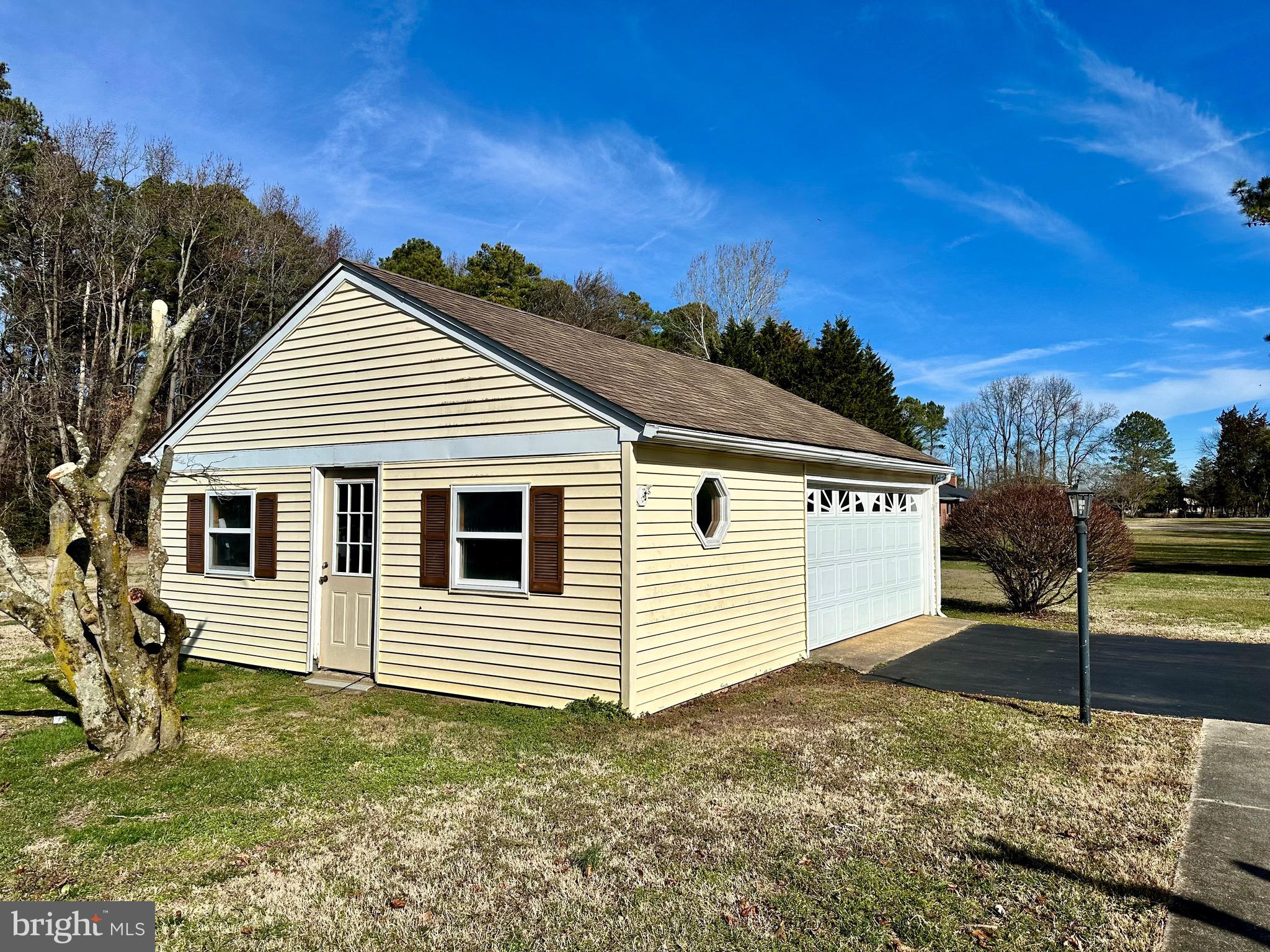 1111 Camp Road Denton, MD 21629 - Photo 11 of 33 a view of a house with a yard