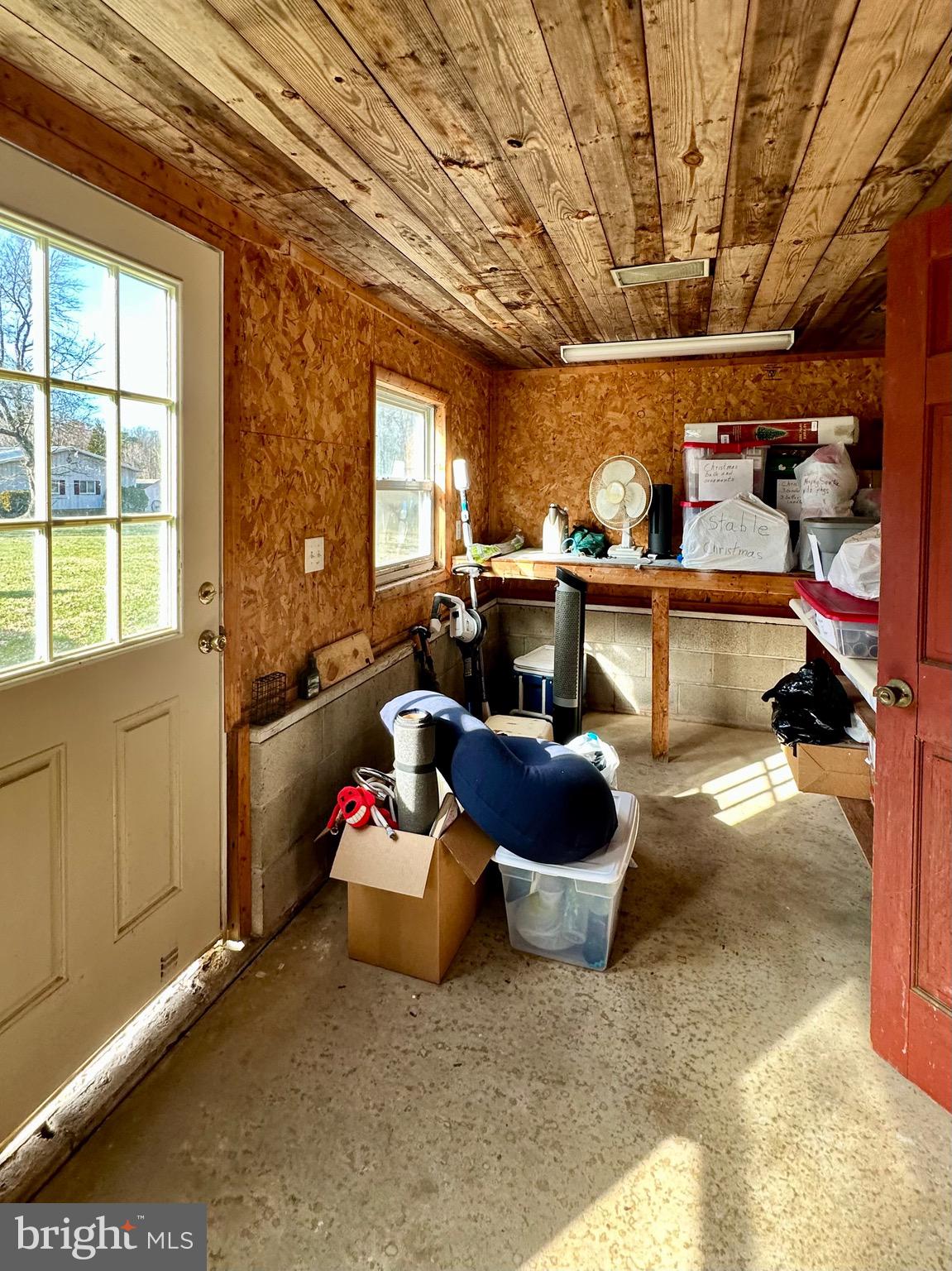 1111 Camp Road Denton, MD 21629 - Photo 13 of 33 a living room with furniture and a window
