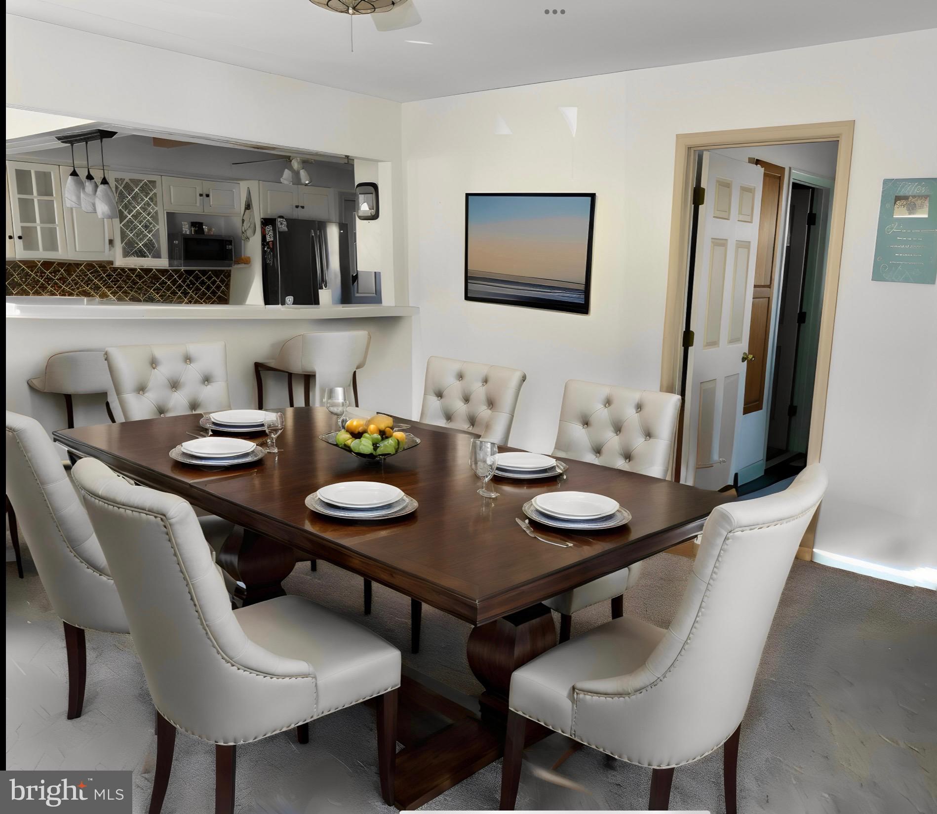 1111 Camp Road Denton, MD 21629 - Photo 18 of 33 a view of a dining room with furniture and wooden floor