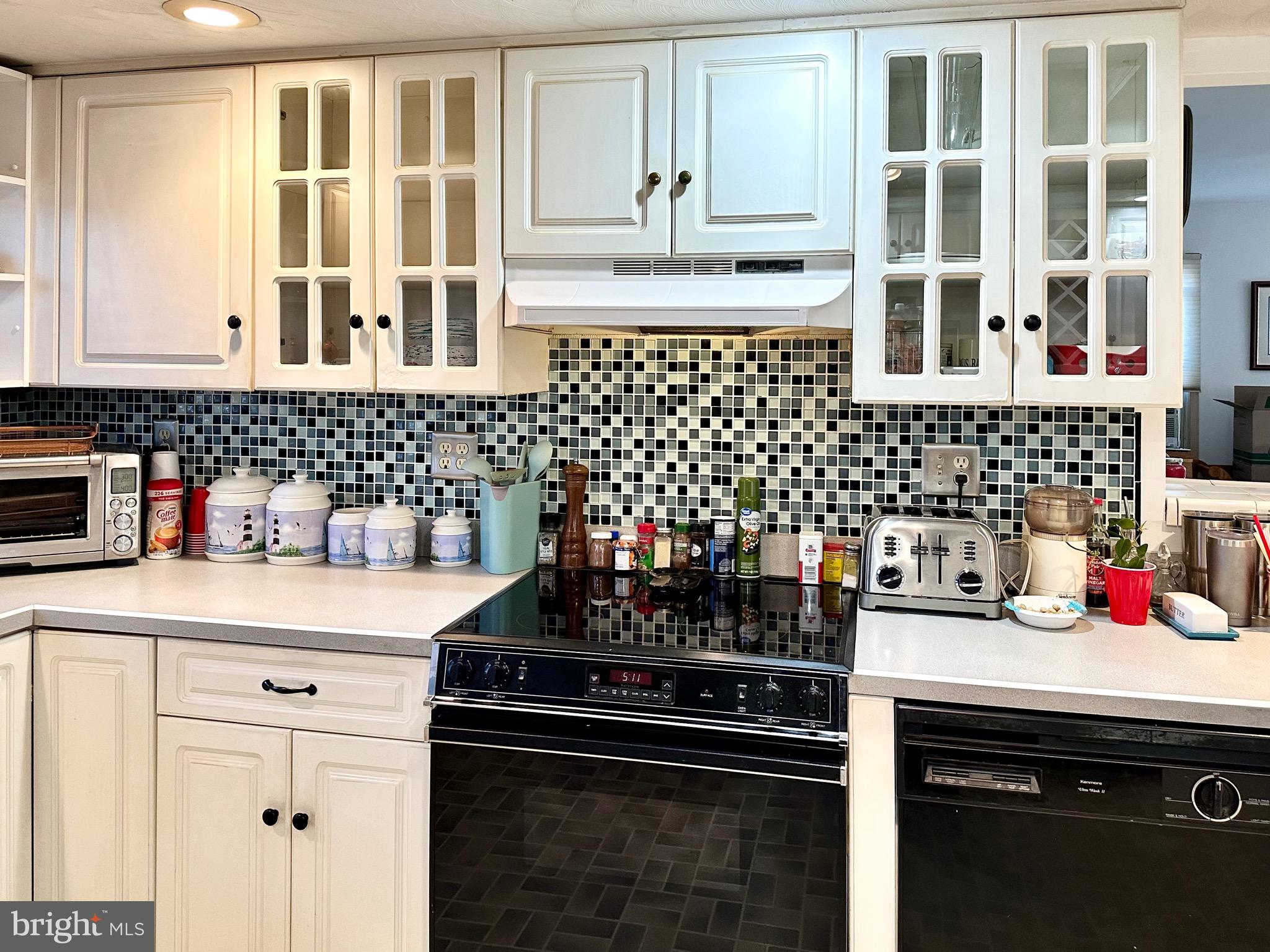 1111 Camp Road Denton, MD 21629 - Photo 25 of 33 a kitchen with a sink stove and cabinets