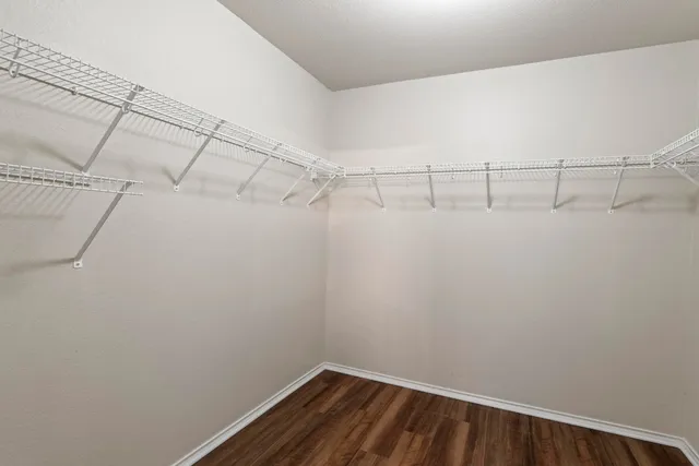 a view of a room with racks on the wall