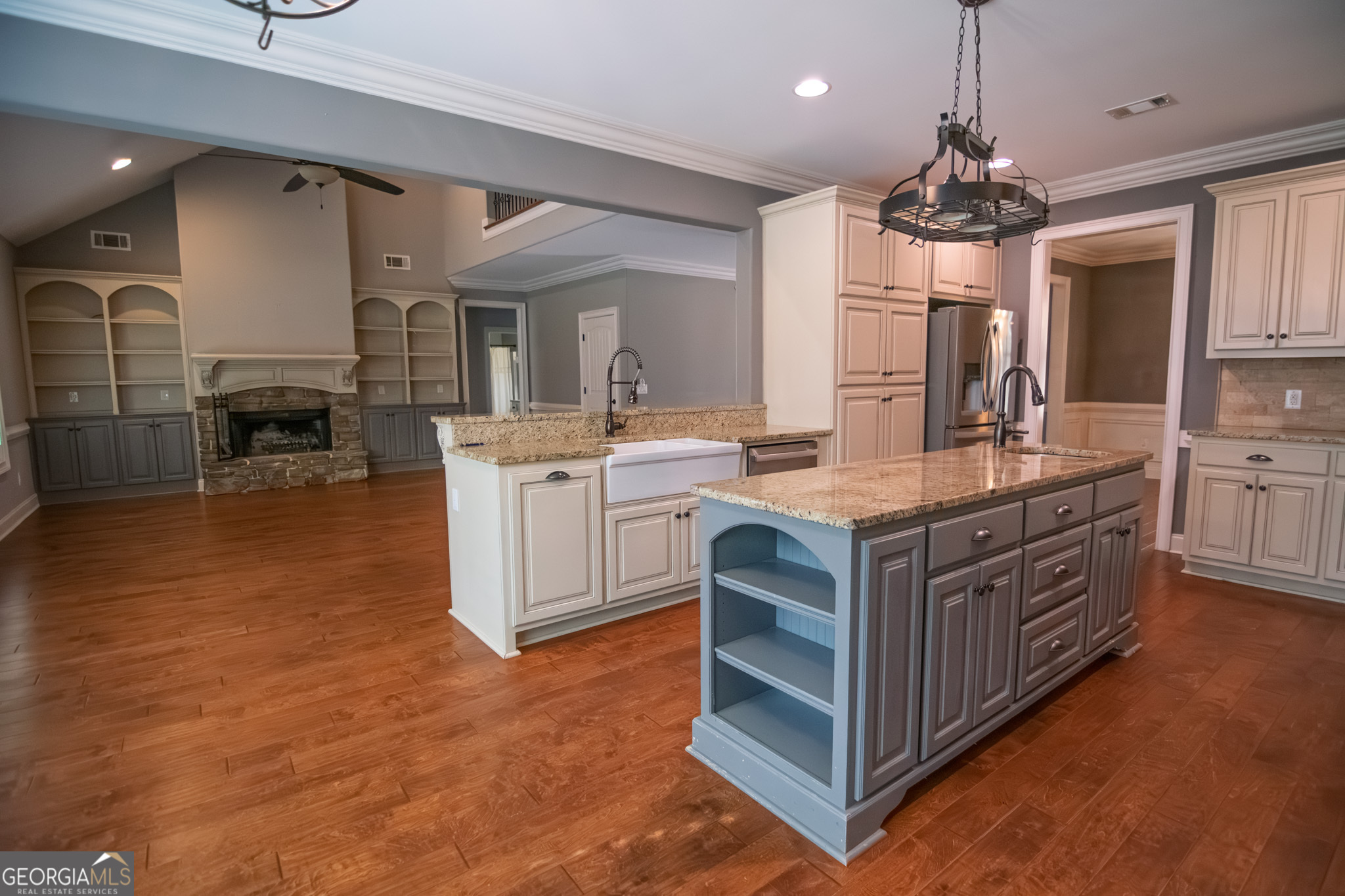 3337 Lower Blue Springs Road Hamilton, GA 31811 - Photo 11 of 41 a kitchen with stainless steel appliances granite countertop a stove oven and a refrigerator