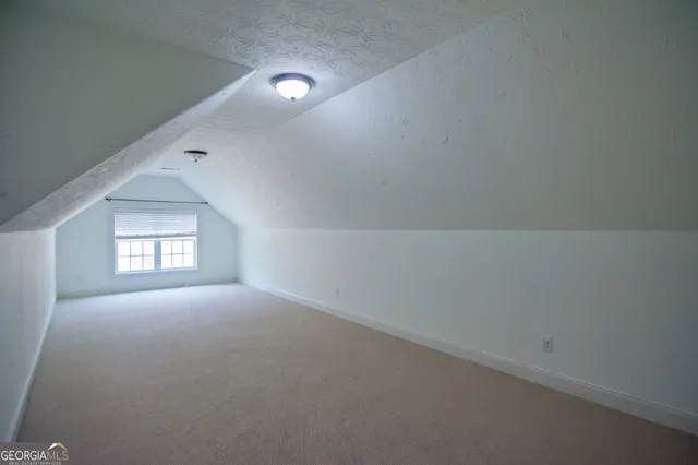 an empty room that has a window