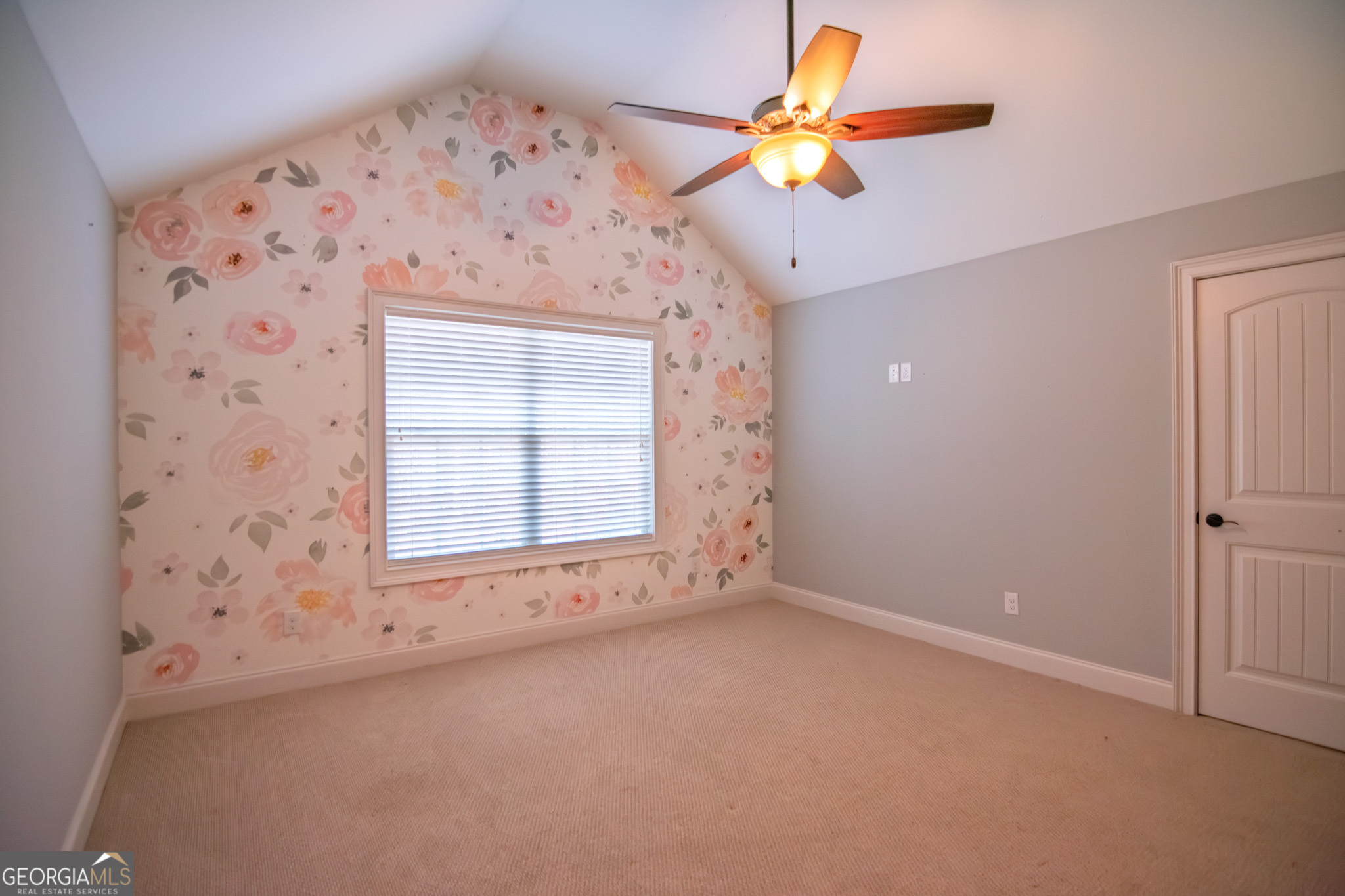 3337 Lower Blue Springs Road Hamilton, GA 31811 - Photo 24 of 41 an empty room with a window and a ceiling fan
