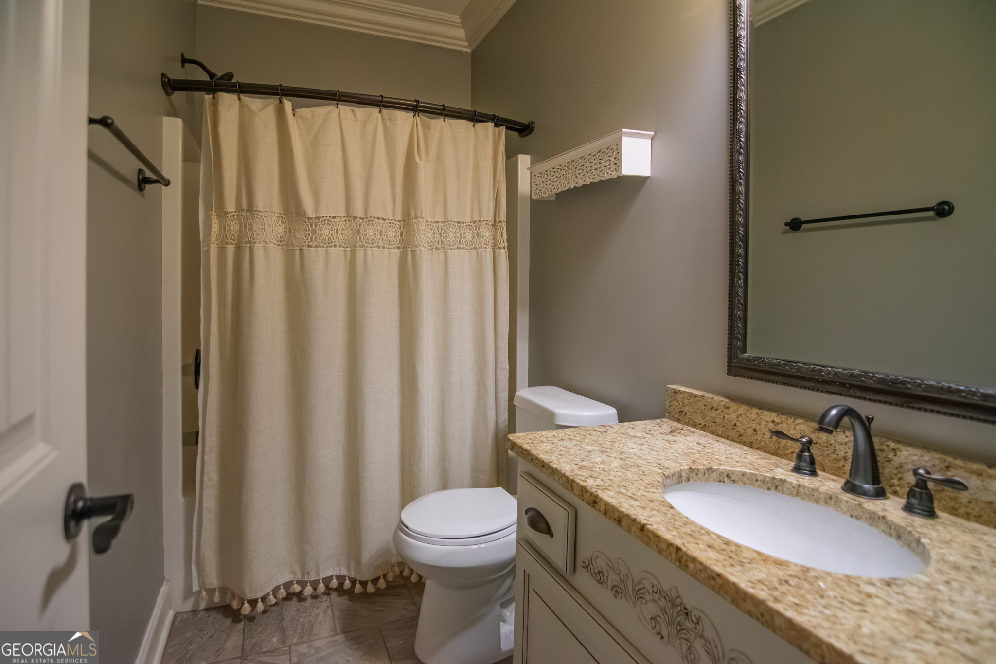 3337 Lower Blue Springs Road Hamilton, GA 31811 - Photo 29 of 41 a bathroom with a granite countertop sink toilet and shower