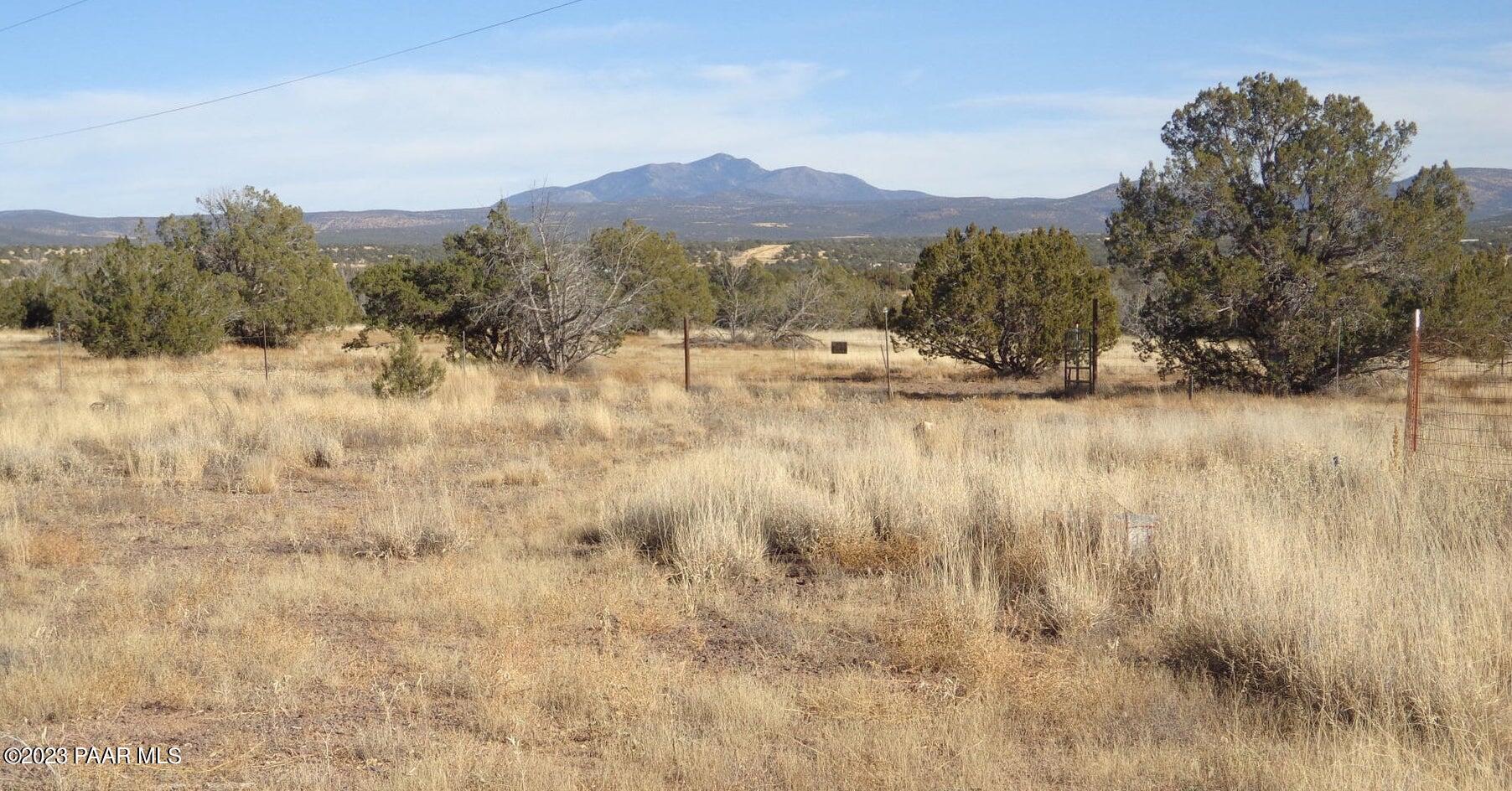 0 North Trackside Trail Ash Fork, AZ 86320 - Photo 8 of 9 a view of a town with mountains in the background