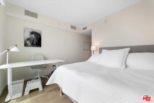 a bathroom with a bathtub and a toilet