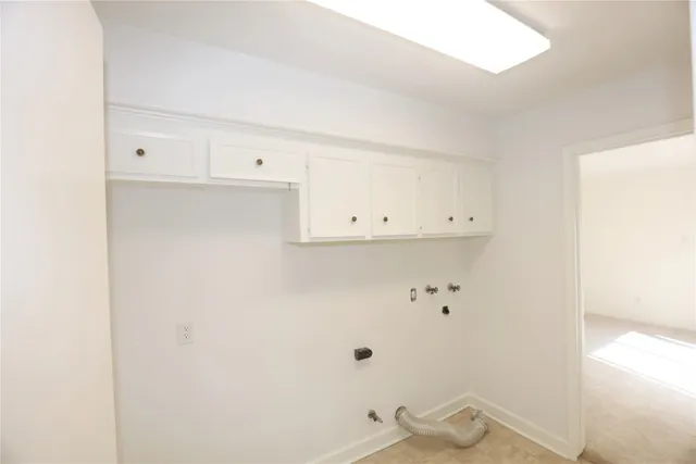 an empty room with a bathroom