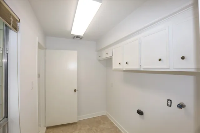 a bathroom with a double vanity sink and mirror