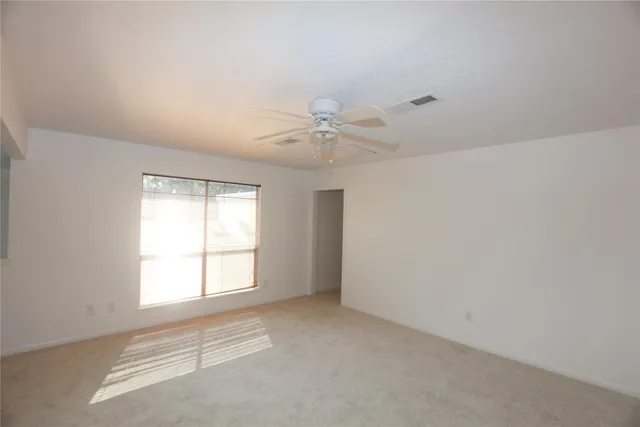 a bathroom with a shower and a bath tub