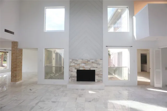 an empty room with windows