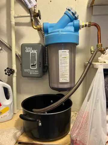 a bathroom with a toilet and a bathtub