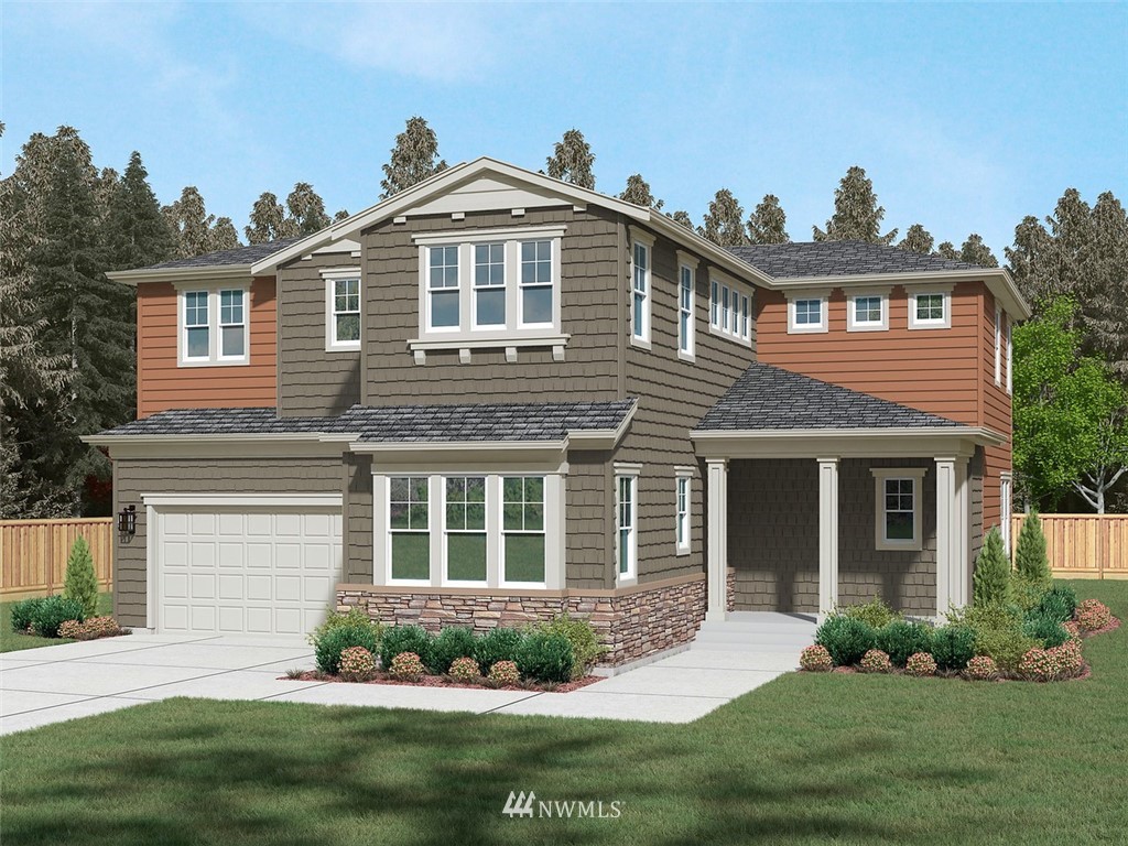 3340 218th Street Southeast, Unit 24 Bothell, WA 98021 - Photo 1 of 25 a front view of a house with a yard