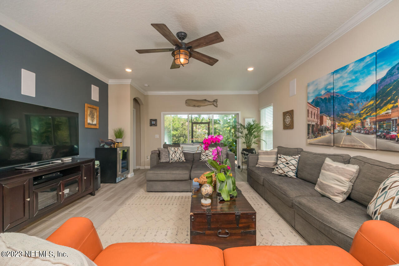 77 Glorieta Drive St. Augustine, FL 32095 - Photo 15 of 67 a living room with furniture and a flat screen tv