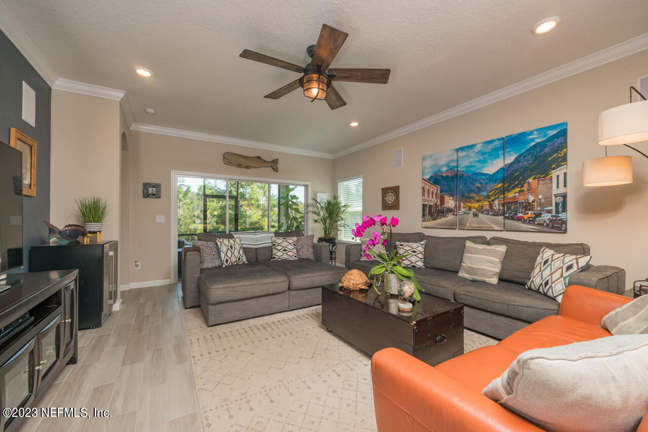 77 Glorieta Drive St. Augustine, FL 32095 - Photo 16 of 67 a living room with furniture and a large window