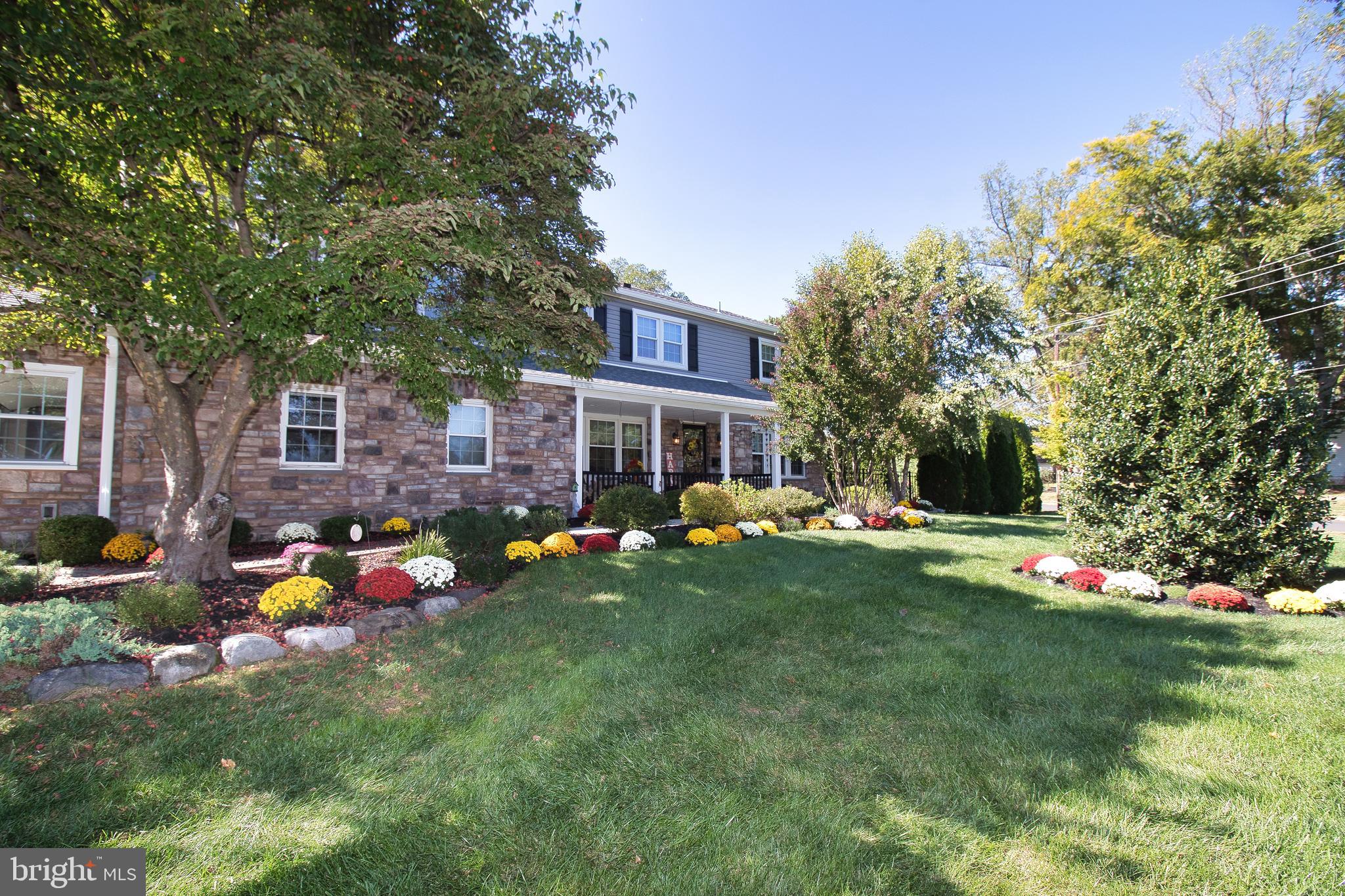 136 Washington Drive Warminster, PA 18974 - Photo 1 of 39 a front view of a house with garden