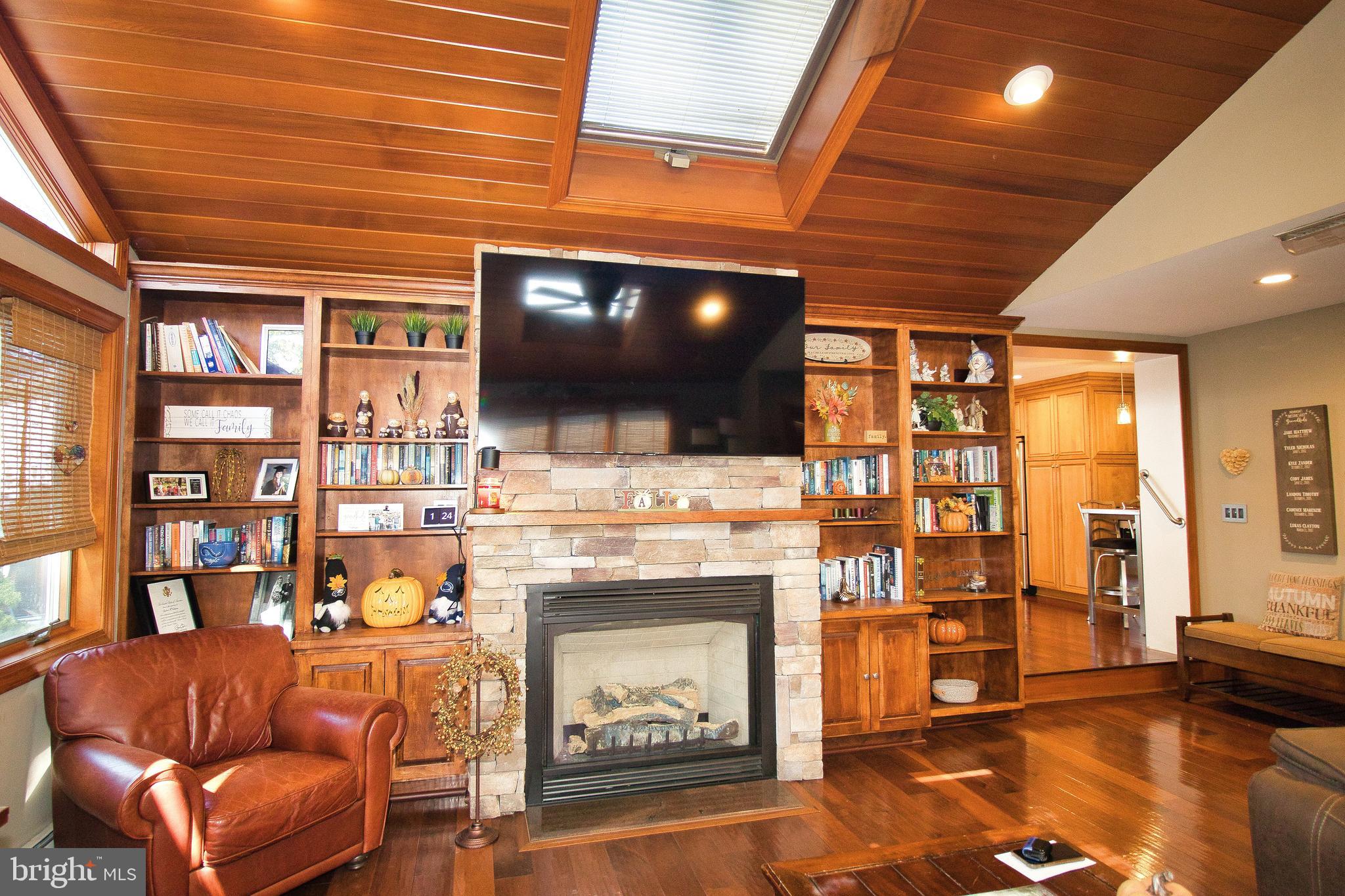 136 Washington Drive Warminster, PA 18974 - Photo 15 of 39 a living room with fireplace furniture and a flat screen tv