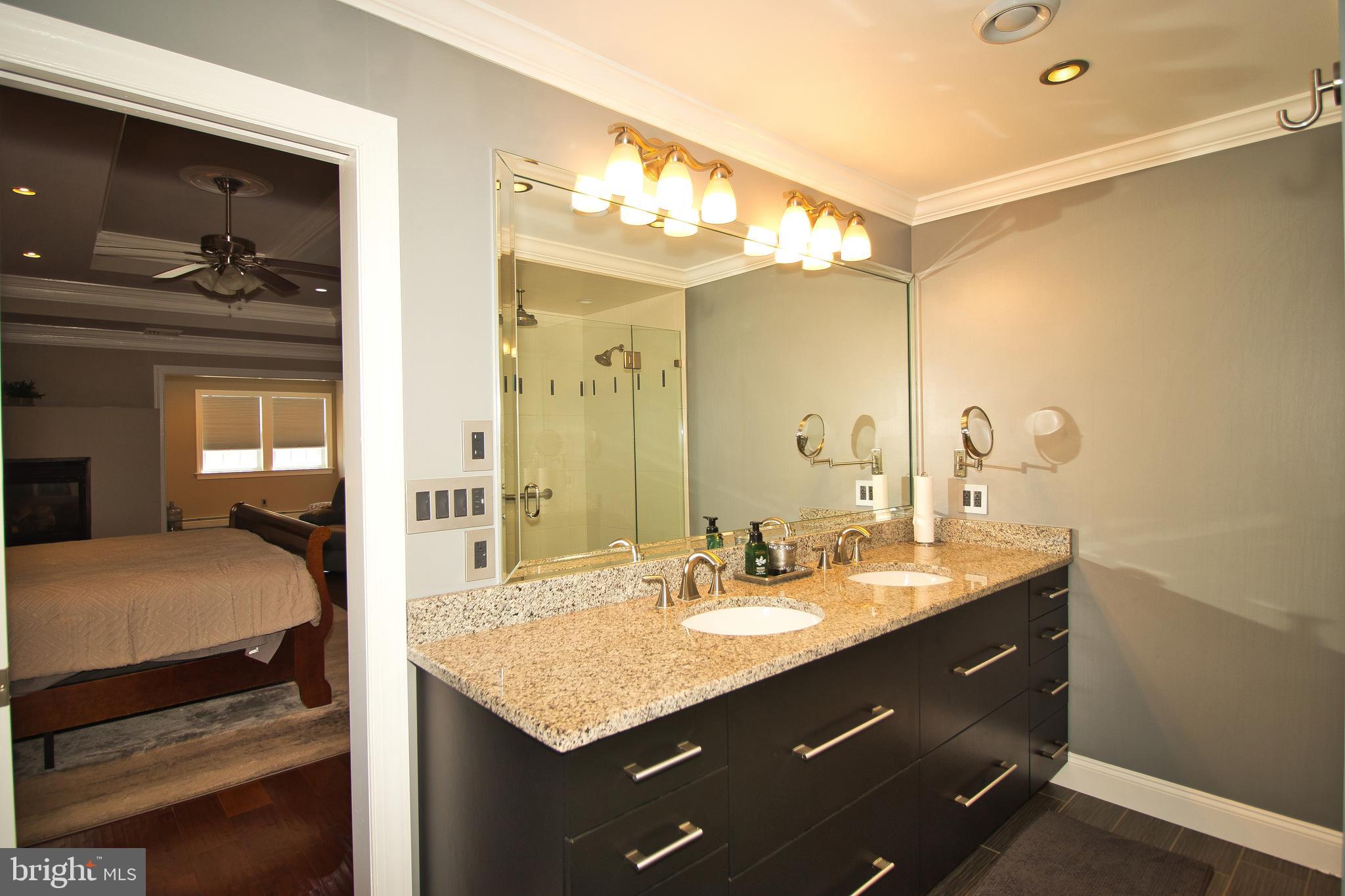 136 Washington Drive Warminster, PA 18974 - Photo 20 of 39 a en suite bathroom with a sink double vanity and a mirror
