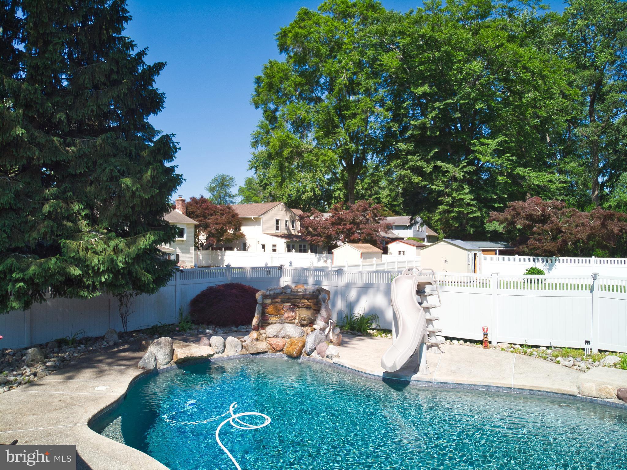 136 Washington Drive Warminster, PA 18974 - Photo 34 of 39 a view of a swimming pool with a yard