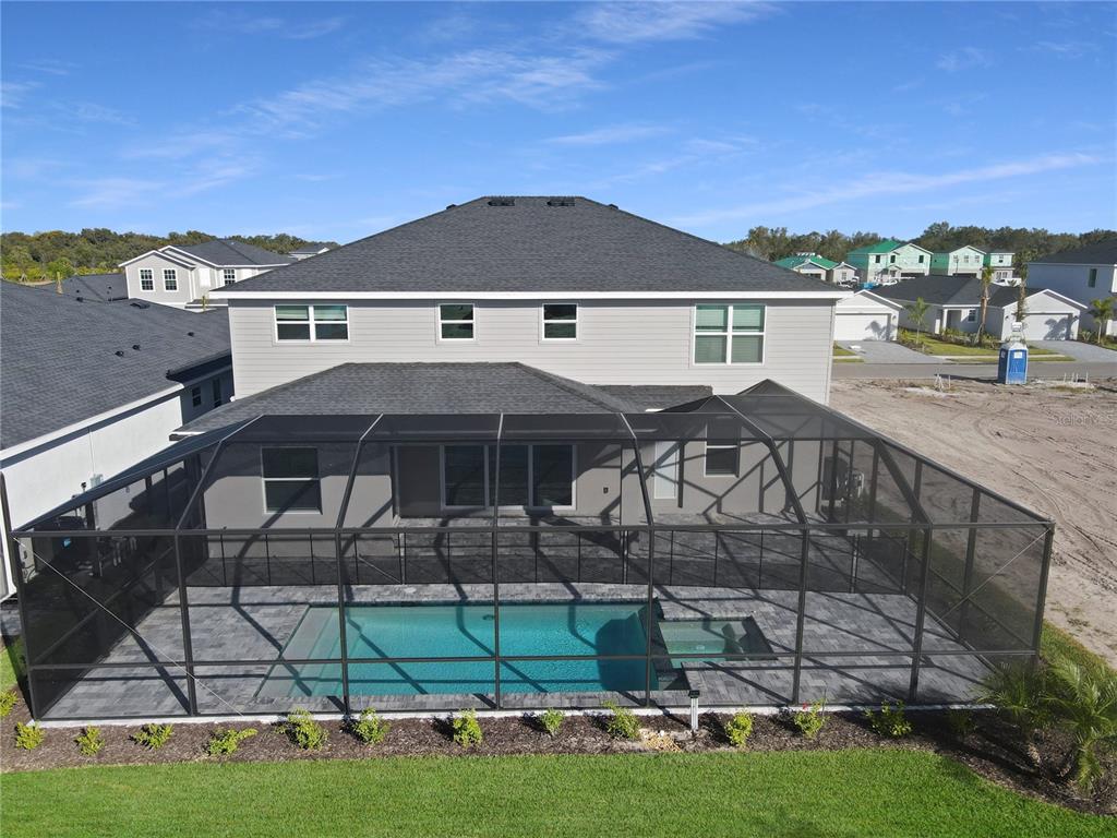 26602 Jasper Way Punta Gorda, FL 33955 - Photo 2 of 2 a front view of house with a garden