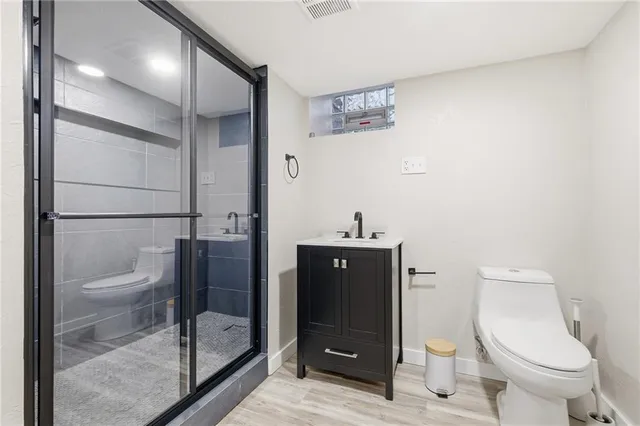 a view of a storage & utility room with washer and dryer