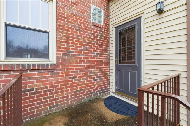 an aerial view of a house with a swimming pool