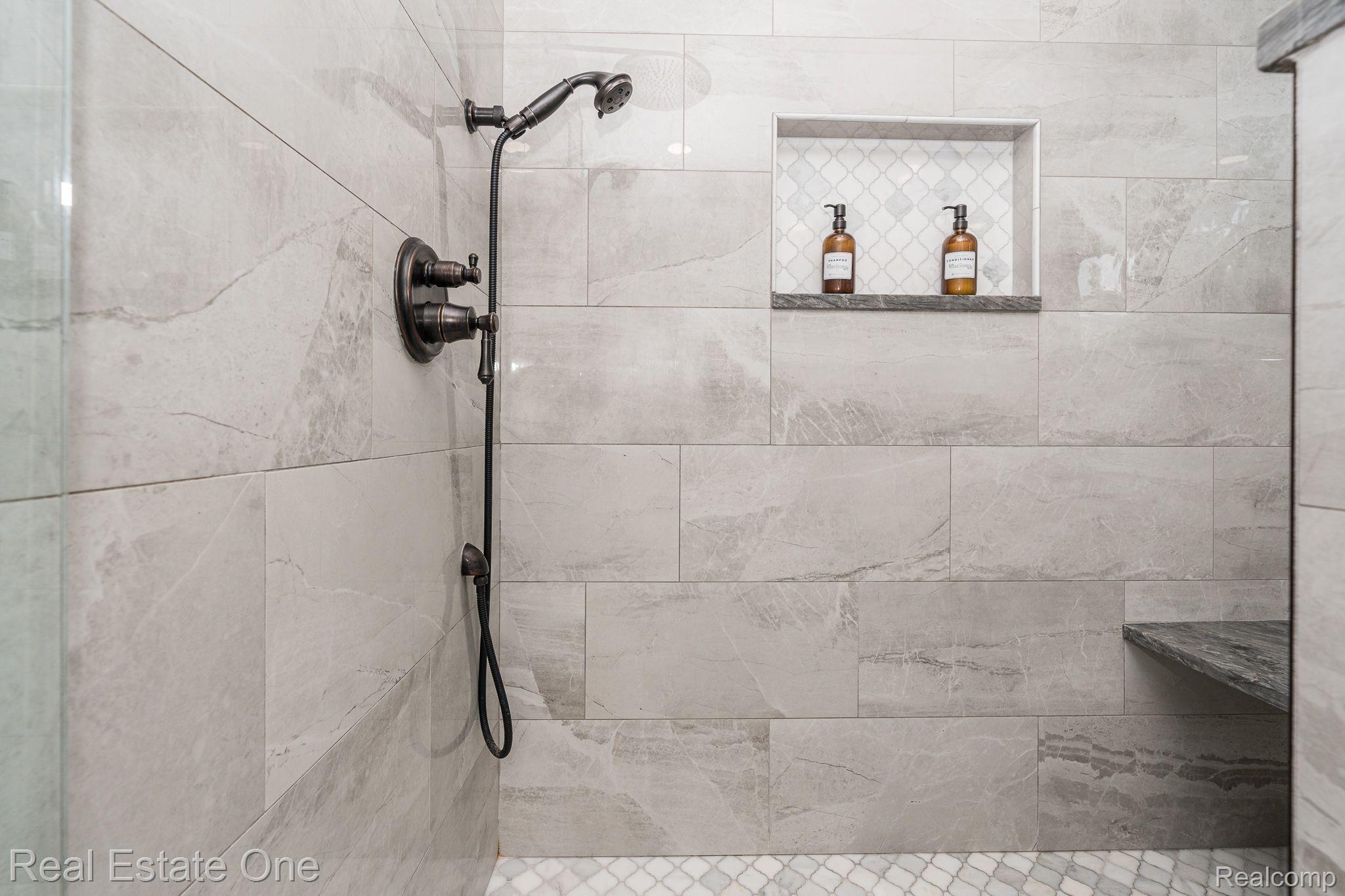 3221 Quail Ridge Circle Rochester, MI 48309 - Photo 41 of 57 Large Shower with Seat and Marble Floor/Custom Dr.