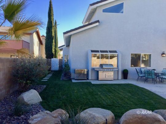 1108 Judy Way Ridgecrest, CA 93555 - Photo 34 of 35 a house view with a sitting space and garden