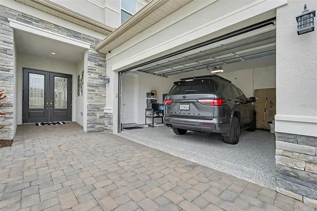 a view of a livingroom with car parked