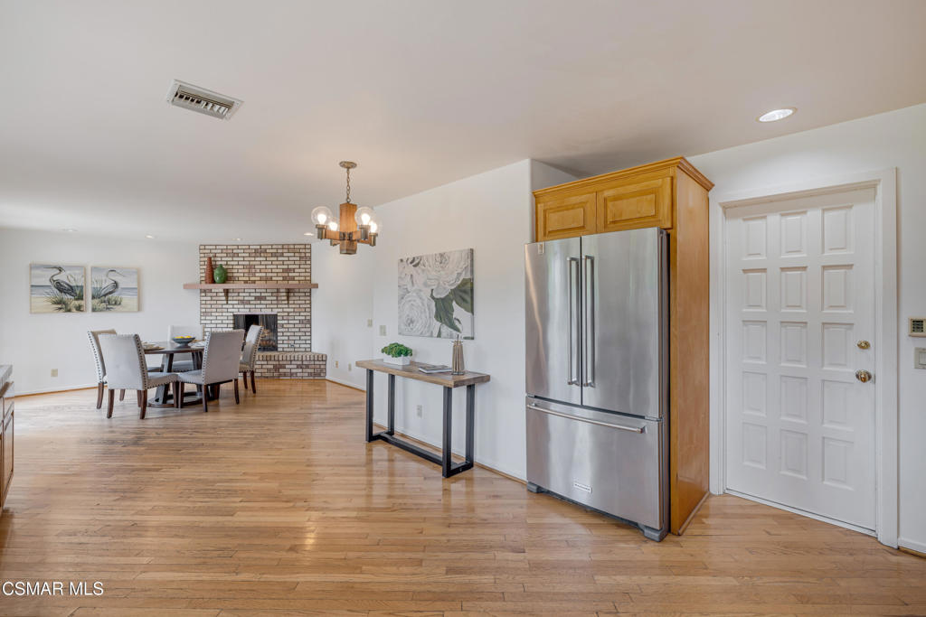 1884 Channel Drive Ventura, CA 93001 - Photo 18 of 62 a kitchen with stainless steel appliances granite countertop a refrigerator and microwave