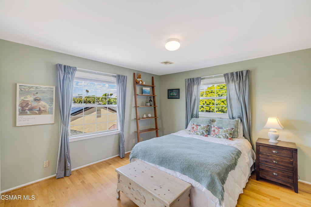 1884 Channel Drive Ventura, CA 93001 - Photo 20 of 62 a bedroom with a bed and a window