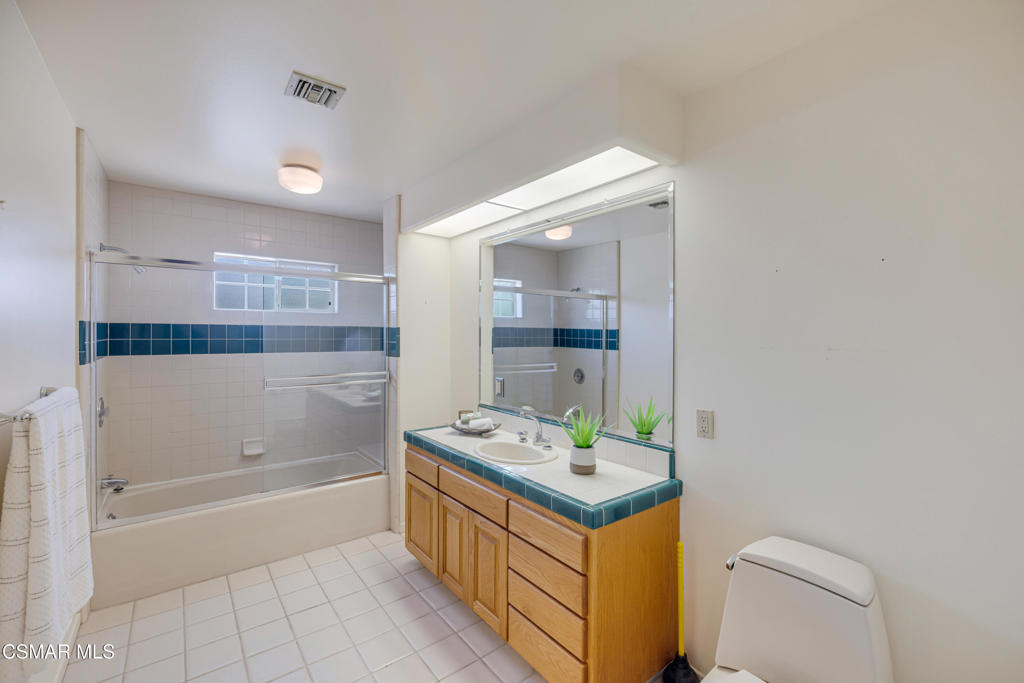 1884 Channel Drive Ventura, CA 93001 - Photo 21 of 62 a bathroom with a sink toilet and shower