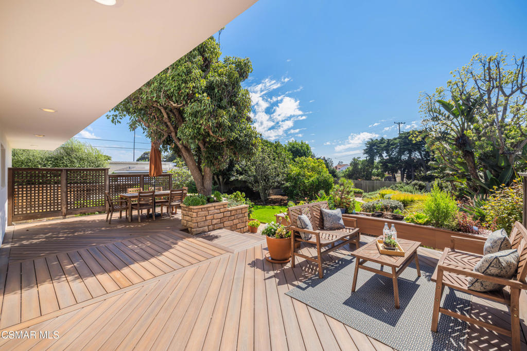 1884 Channel Drive Ventura, CA 93001 - Photo 36 of 62 a view of a patio with couches table and chairs and potted plants