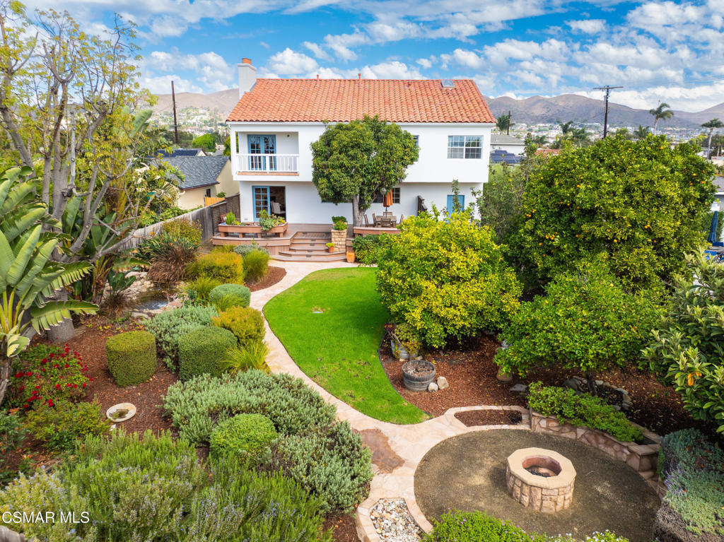 1884 Channel Drive Ventura, CA 93001 - Photo 4 of 62 a front view of a house with garden