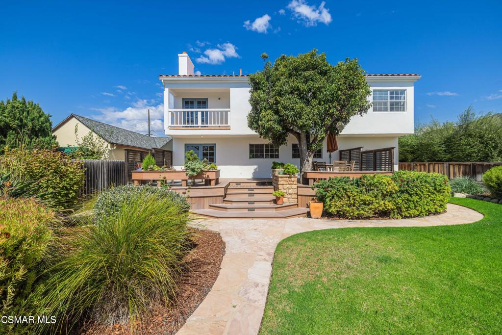 1884 Channel Drive Ventura, CA 93001 - Photo 44 of 62 a front view of a house with a garden