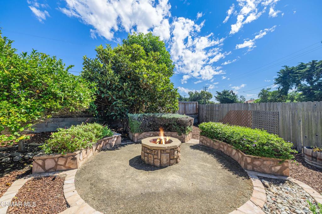 1884 Channel Drive Ventura, CA 93001 - Photo 46 of 62 a view of a backyard with sitting area and garden