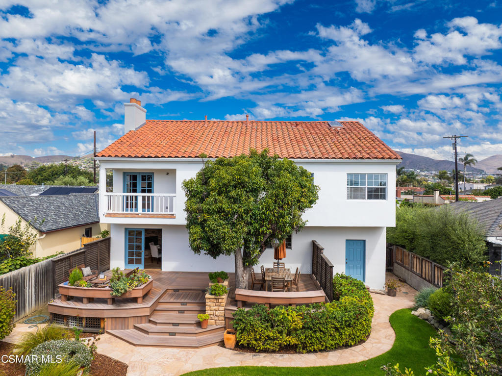 1884 Channel Drive Ventura, CA 93001 - Photo 54 of 62 a front view of a house with garden