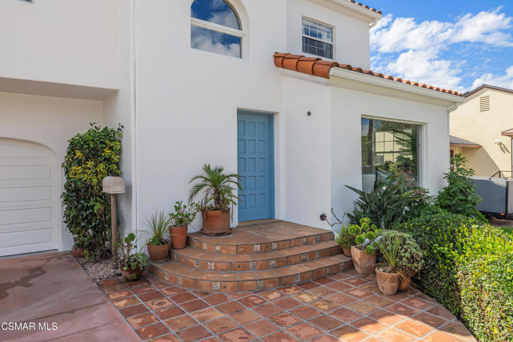 1884 Channel Drive Ventura, CA 93001 - Photo 6 of 62 a house view with a potted plant in front of it