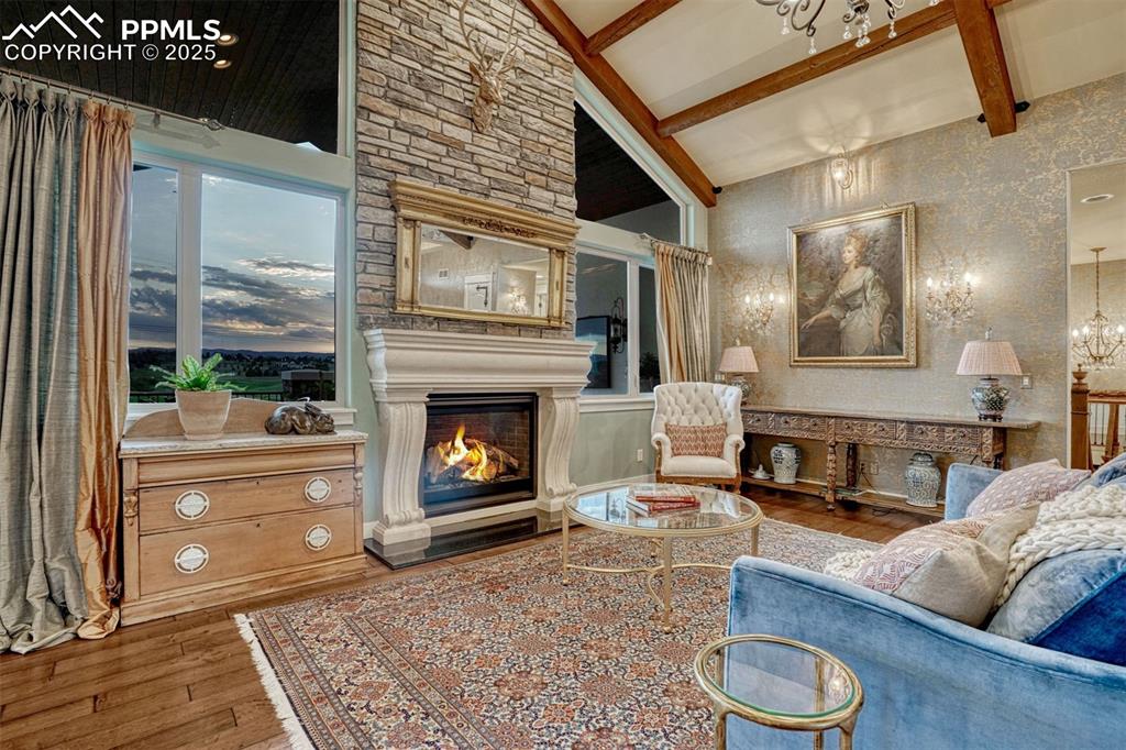 1935 Bashley Road Monument, CO 80132 - Photo 13 of 45 a living room with furniture and a fireplace