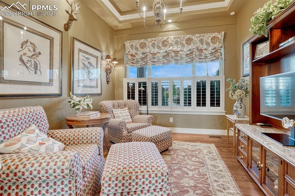 1935 Bashley Road Monument, CO 80132 - Photo 19 of 45 a bedroom with furniture and a large window
