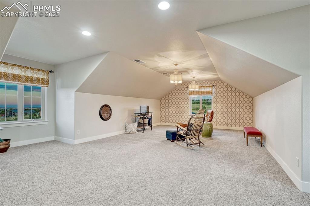 1935 Bashley Road Monument, CO 80132 - Photo 24 of 45 a view of a livingroom with furniture and a large window