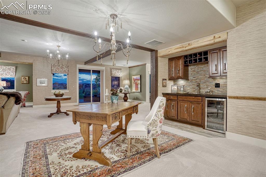 1935 Bashley Road Monument, CO 80132 - Photo 32 of 45 a large kitchen with a table and chairs