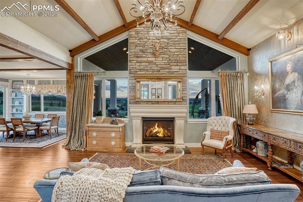 1935 Bashley Road Monument, CO 80132 - Photo 4 of 45 a living room with furniture and a fireplace