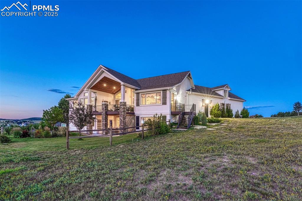 1935 Bashley Road Monument, CO 80132 - Photo 43 of 45 a view of a house with a big yard