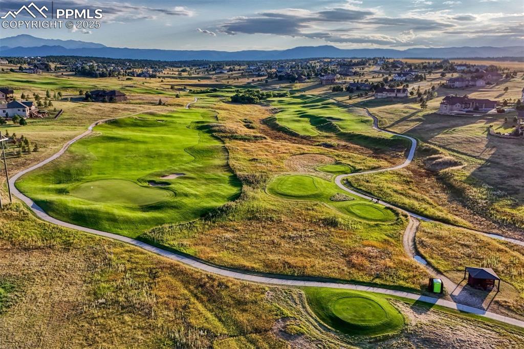 1935 Bashley Road Monument, CO 80132 - Photo 44 of 45 a view of a swimming pool with a table and chairs