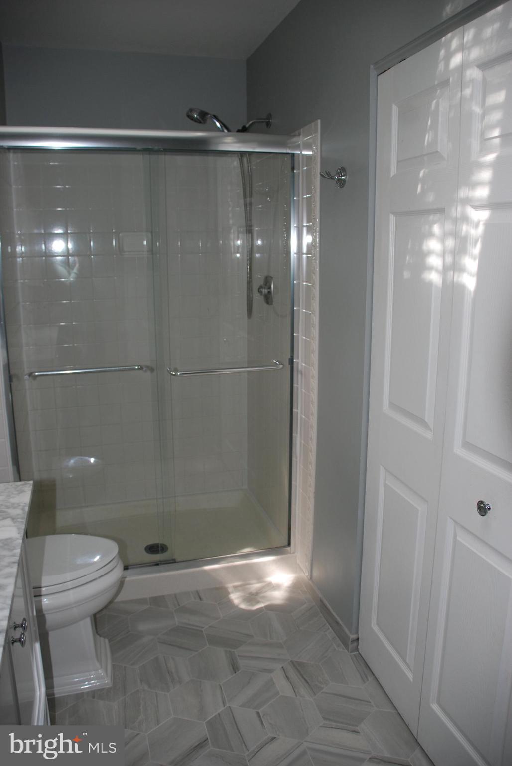 6108 Eagle Landing Road Burke, VA 22015 - Photo 29 of 52 Over-sized shower and BIG linen/storage closet.