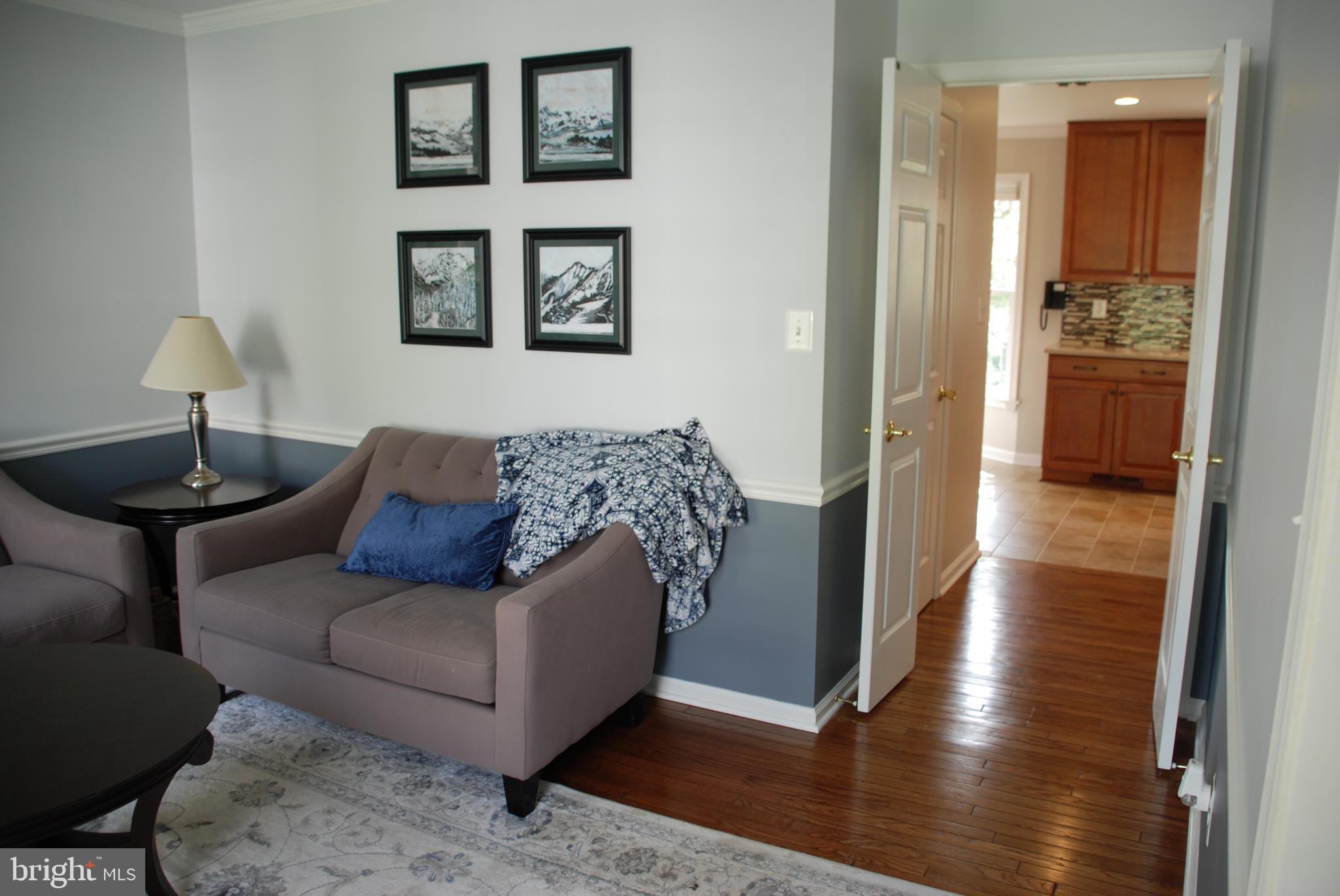 6108 Eagle Landing Road Burke, VA 22015 - Photo 7 of 52 Double doors from LR lead to half bath & Kitchen.
