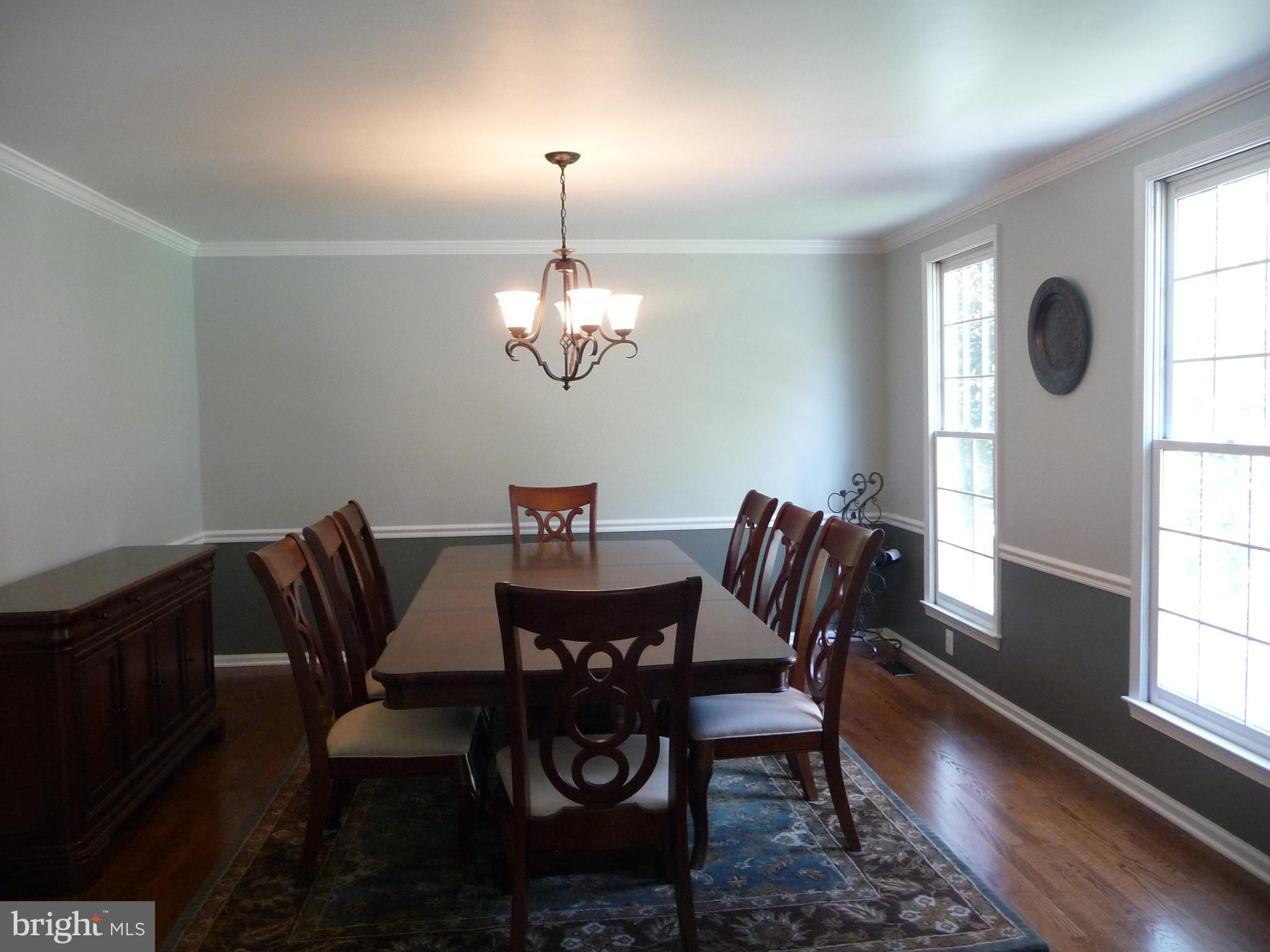 6108 Eagle Landing Road Burke, VA 22015 - Photo 8 of 52 17 x 13 DR off Foyer w/crown molding & chair rail.
