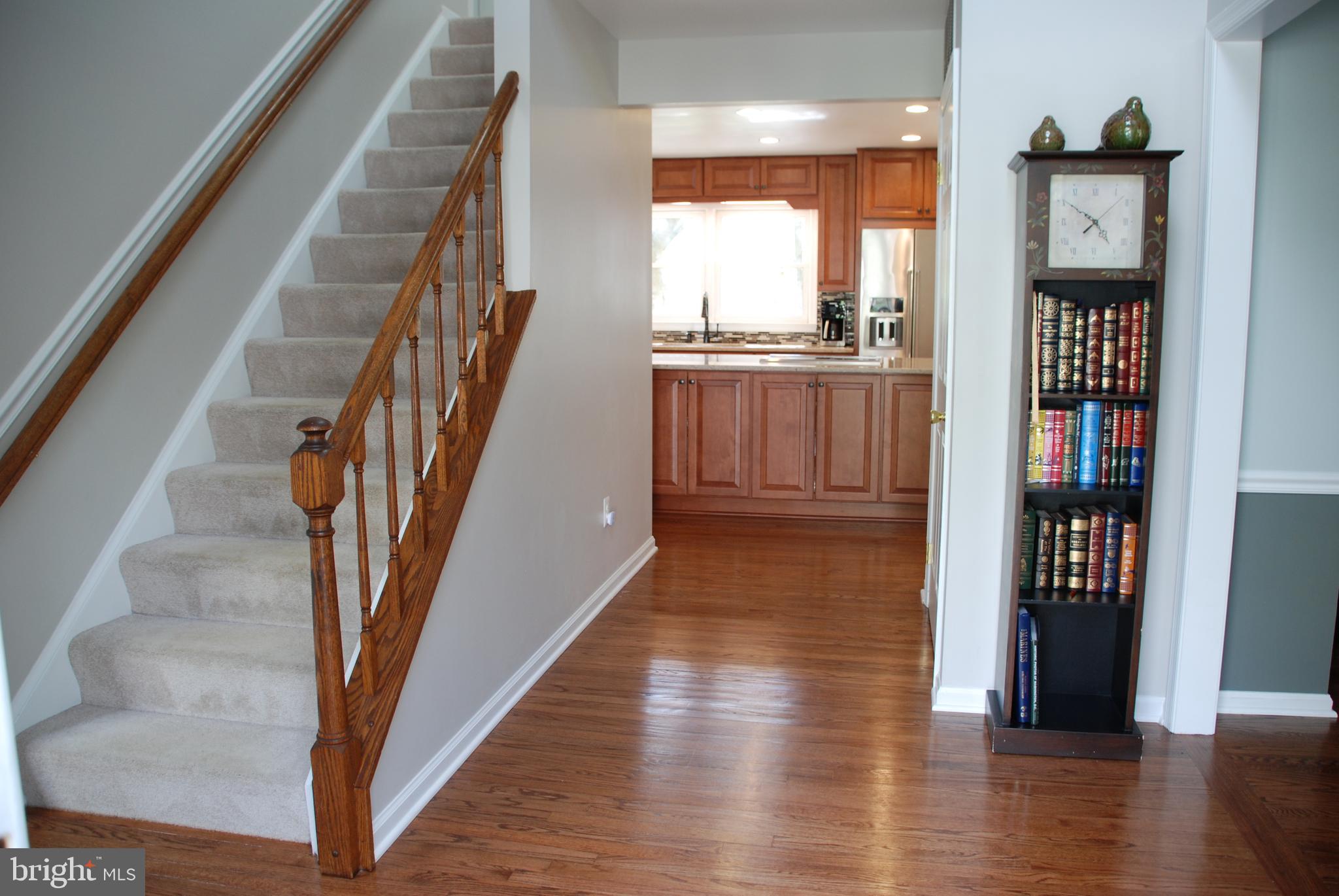 6108 Eagle Landing Road Burke, VA 22015 - Photo 10 of 52 Wide Center Hall leads from Foyer into the Kitchen