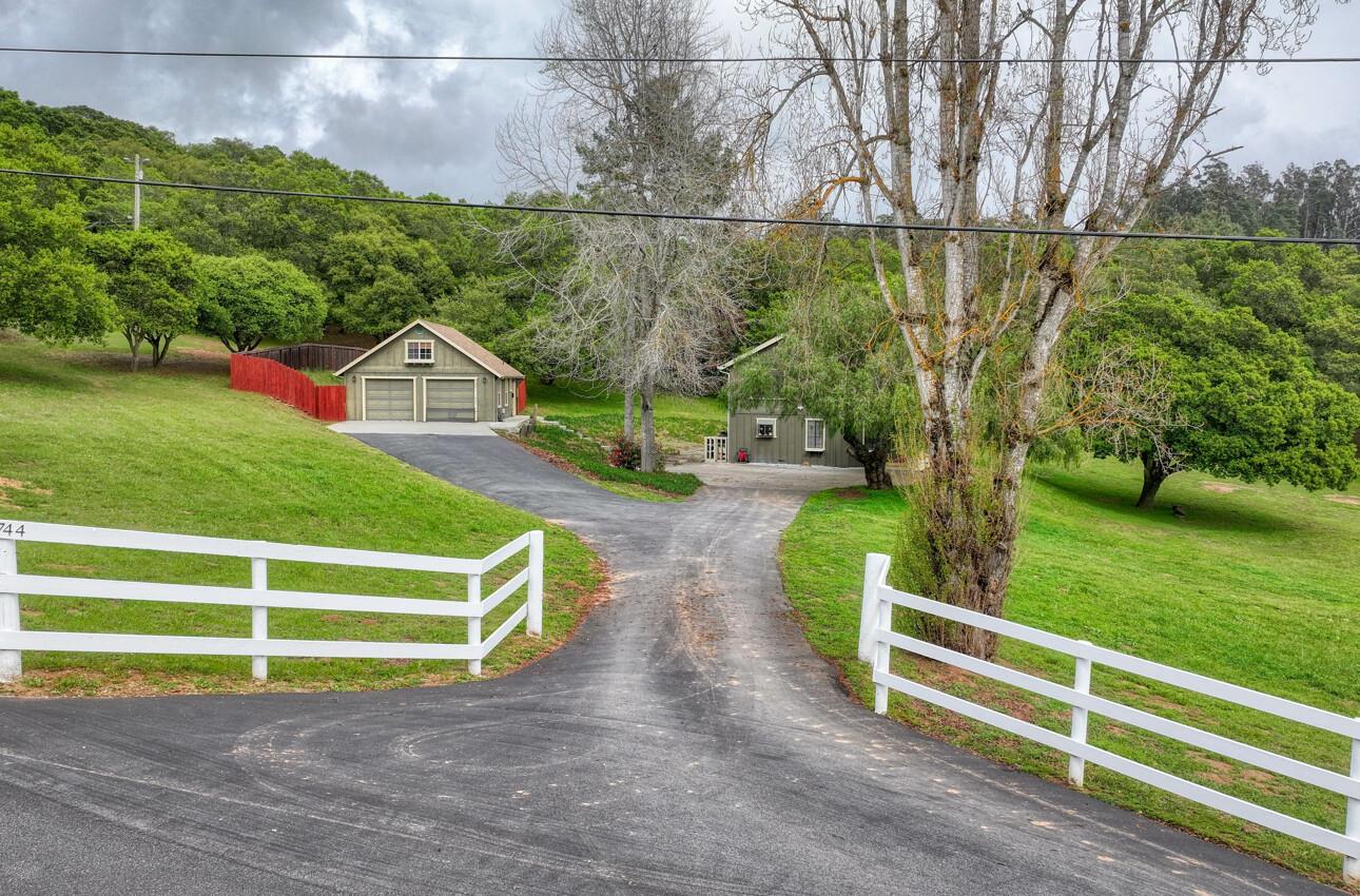 a view of a house with a park
